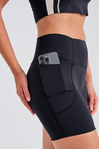 Leggings Cortos Negros con Bolsillos y Cintura Compresiva