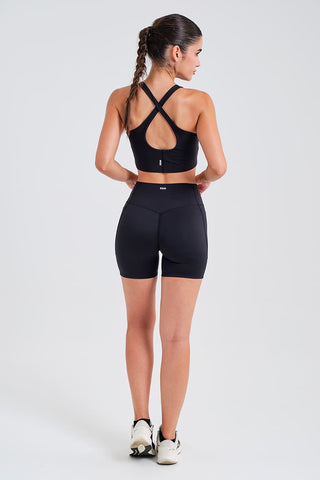 Leggings Cortos Negros con Bolsillos y Cintura Compresiva