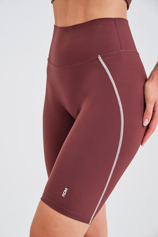 Leggings Ciclistas Burdeos con Cintura Compresiva y Detalle en Contraste