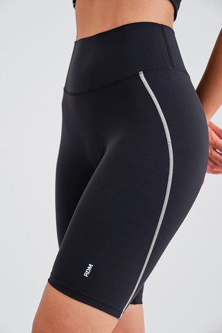 Leggings Ciclistas Negros con Cintura Compresiva y Detalle en Contraste