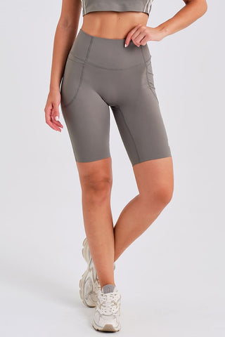 Leggings Ciclistas Grises con Bolsillos y Cintura Compresiva