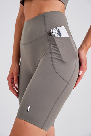 Leggings Ciclistas Grises con Bolsillos y Cintura Compresiva