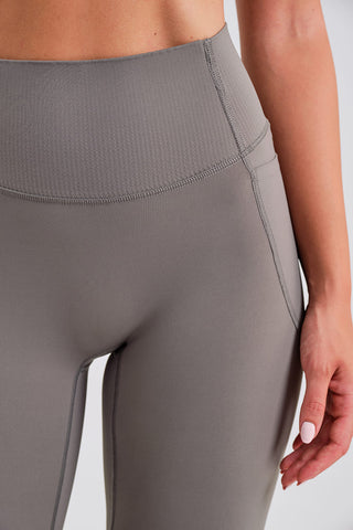 Leggings Ciclistas Grises con Bolsillos y Cintura Compresiva